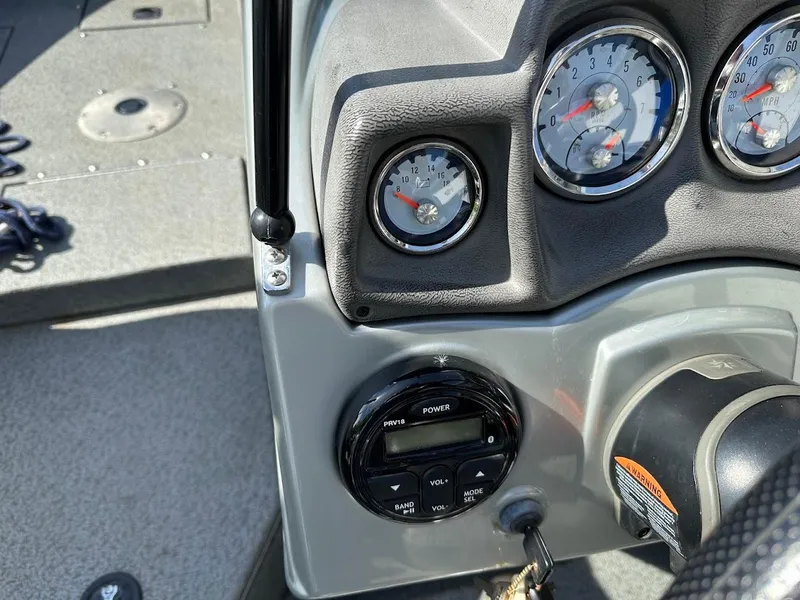 Slide: The Image of Dashboard of a 2018 Tracker Targa V-19 WT boat with gauges and controls. - 15