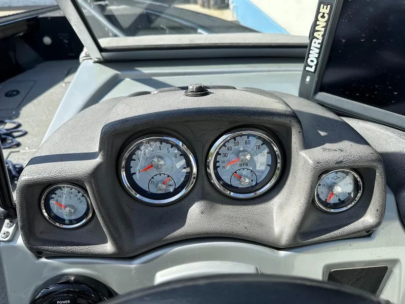Slide: The Image of Dashboard of 2018 Tracker Targa V-19 WT boat with gauges and Lowrance device. - 16