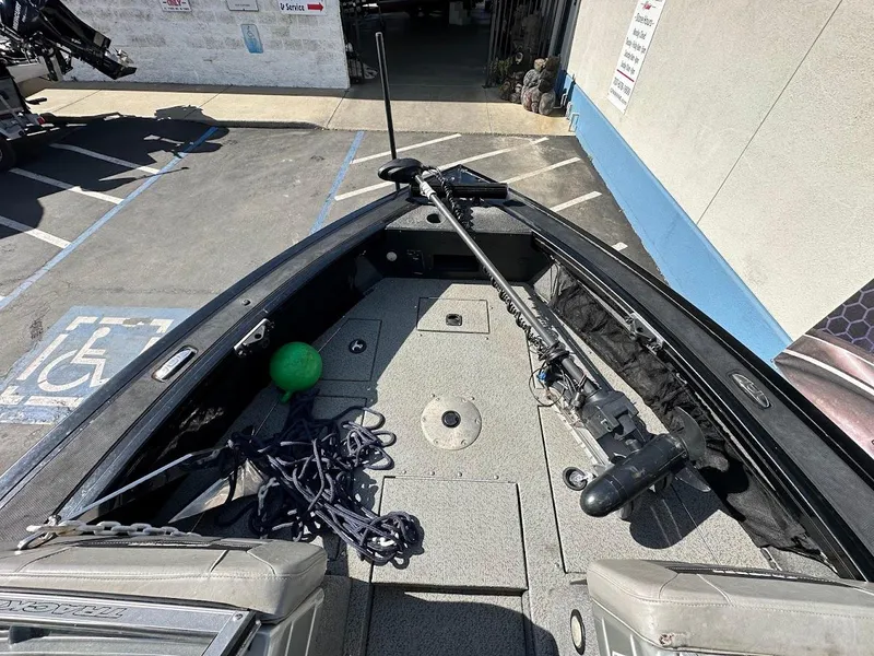 Slide: The Image of 2018 Tracker Targa V-19 WT boat interior with fishing gear and equipment. - 20