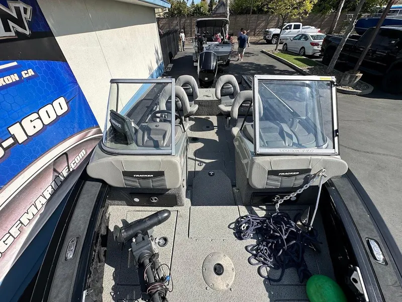 Slide: The Image of 2018 Tracker Targa V-19 WT boat with dual consoles and fishing gear on deck. - 21