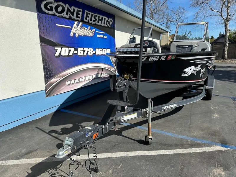 Slide: The Image of 2018 Tracker Targa V-19 WT boat on trailer, parked outside Gone Fishin' Marine. - 3