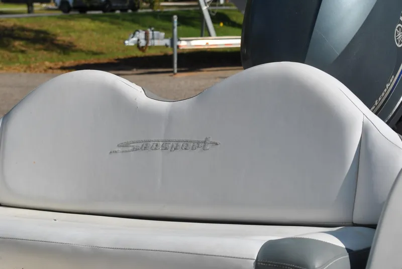 Slide: The Image of 2017 Avon Seasport 340 Deluxe boat seat with logo, outdoor setting. - 15
