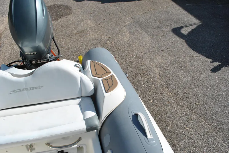 Slide: The Image of 2017 Avon Seasport 340 Deluxe boat with outboard motor, viewed from above. - 20