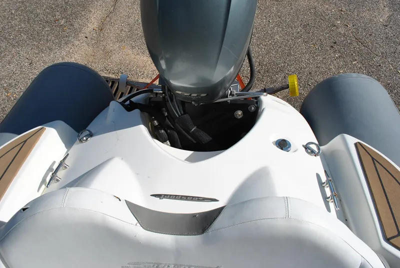 Slide: The Image of 2017 Avon Seasport 340 Deluxe boat, top view of engine and seating area. - 22