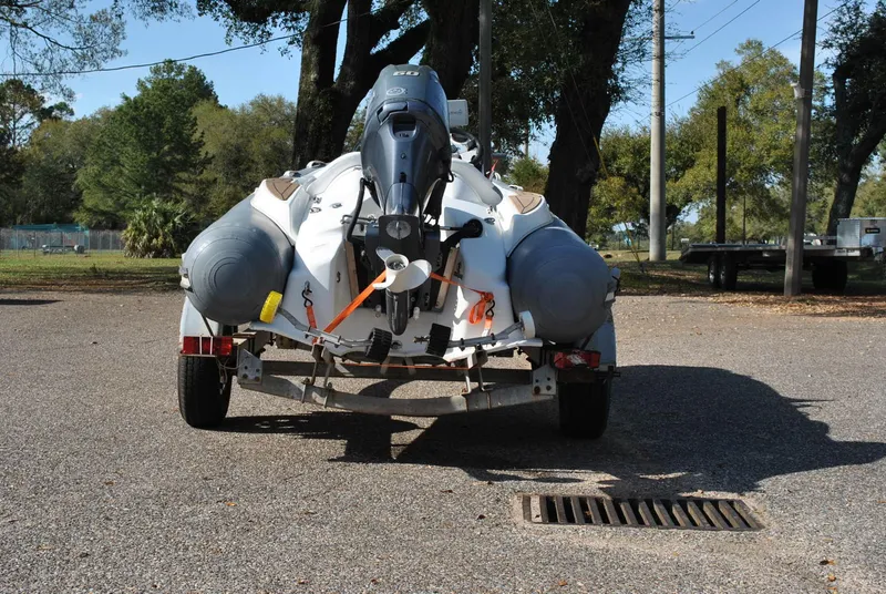 Slide: The Image of 2017 Avon Seasport 340 Deluxe boat on trailer, parked outdoors. - 9