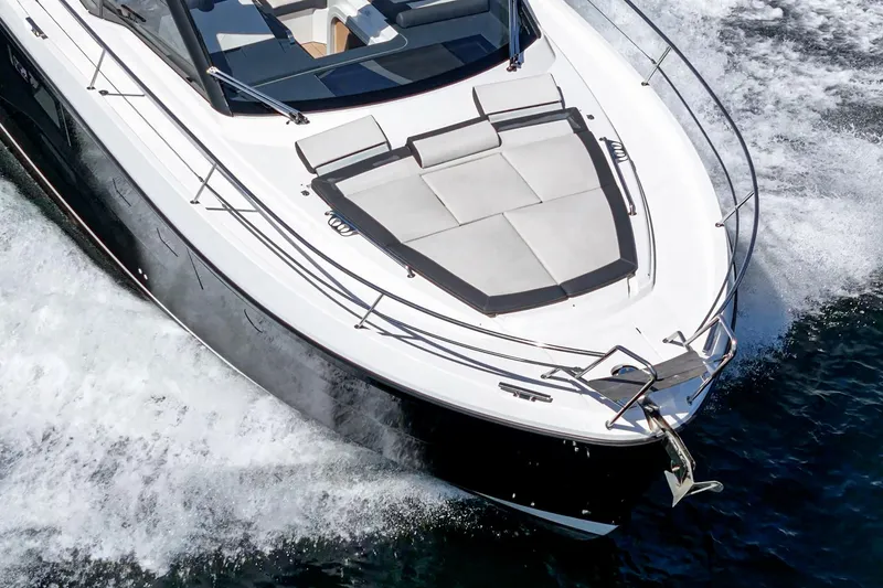 Slide: The Image of 2023 Bavaria SR36 yacht cruising on open water, showcasing sleek design and luxury features. - 22