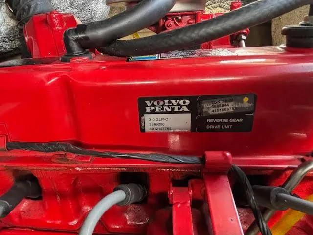 Slide: The Image of Red Volvo Penta engine in a 2005 Glastron MX 175 boat. - 23