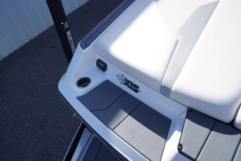 Slide: The Image of 2019 Axis A22 boat rear deck with sleek design and logo. - 13