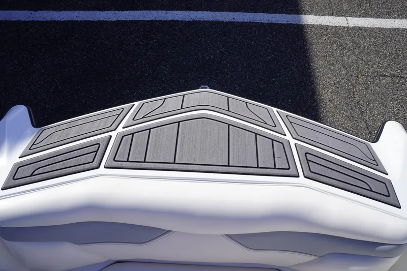 Slide: The Image of 2019 Axis A22 boat deck with textured gray padding. - 25