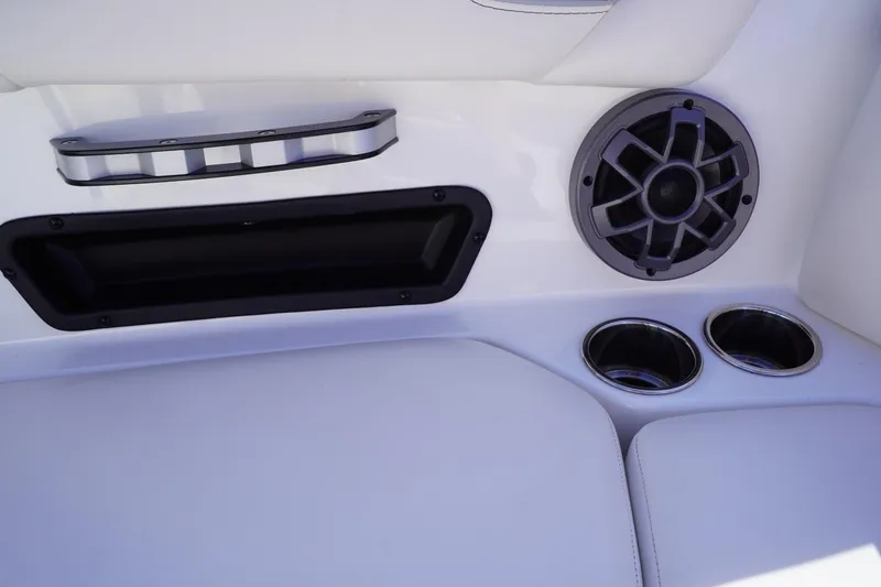 Slide: The Image of Interior of 2019 Axis A22 boat with speaker and cup holders. - 29