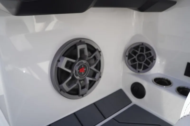 Slide: The Image of 2019 Axis A22 boat interior speakers and cup holders. - 31