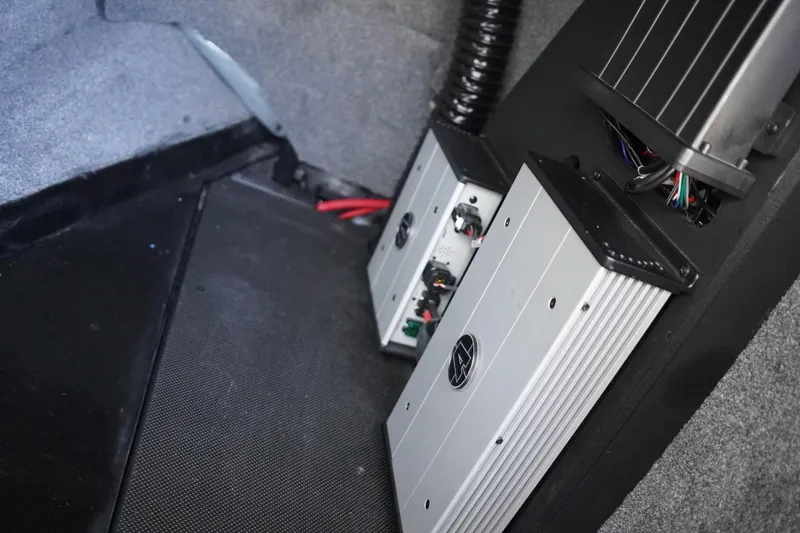 Slide: The Image of 2019 Axis A22 interior showing audio system components and wiring. - 38