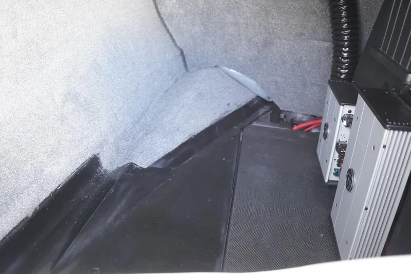 Slide: The Image of 2019 Axis A22 interior compartment with electronic equipment and wiring. - 39