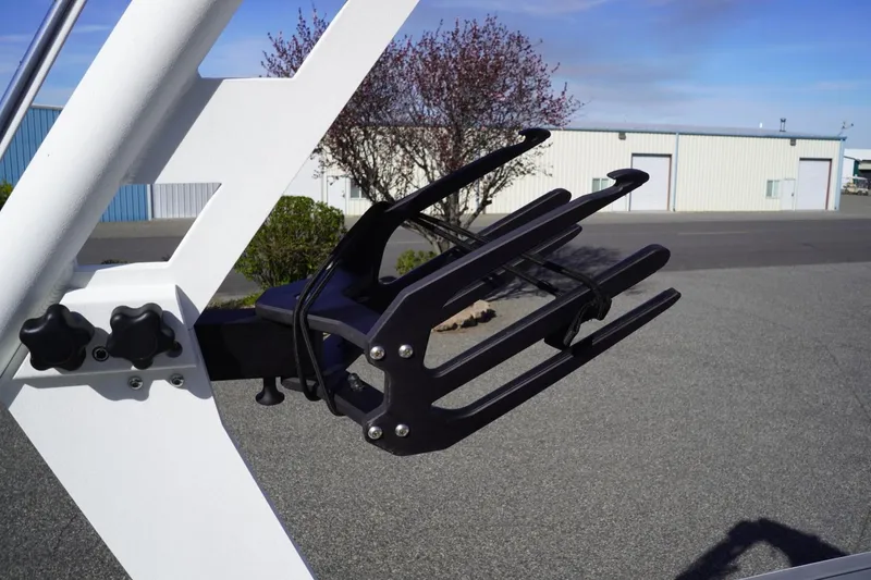 Slide: The Image of 2019 Axis A22 boat wakeboard rack against industrial background. - 42