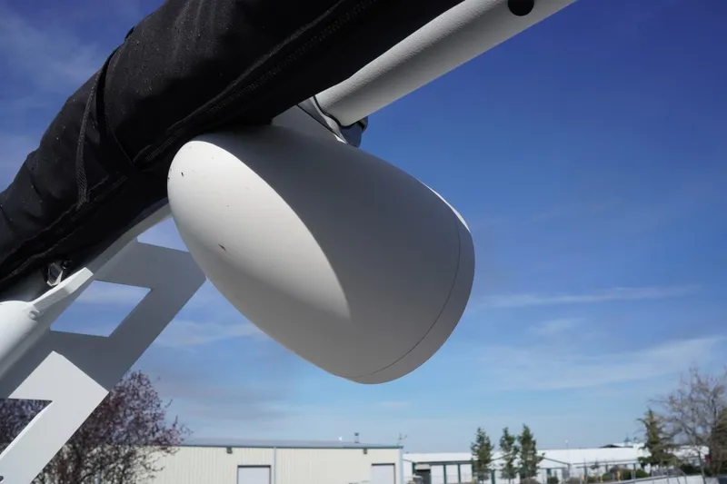 Slide: The Image of 2019 Axis A22 boat speaker mounted under canopy against blue sky. - 45
