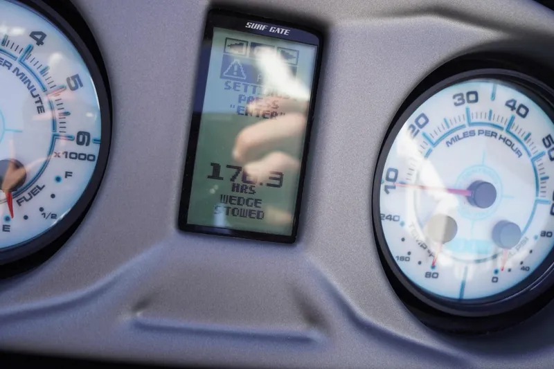 Slide: The Image of Dashboard of 2019 Axis A22 boat showing gauges and digital display. - 49