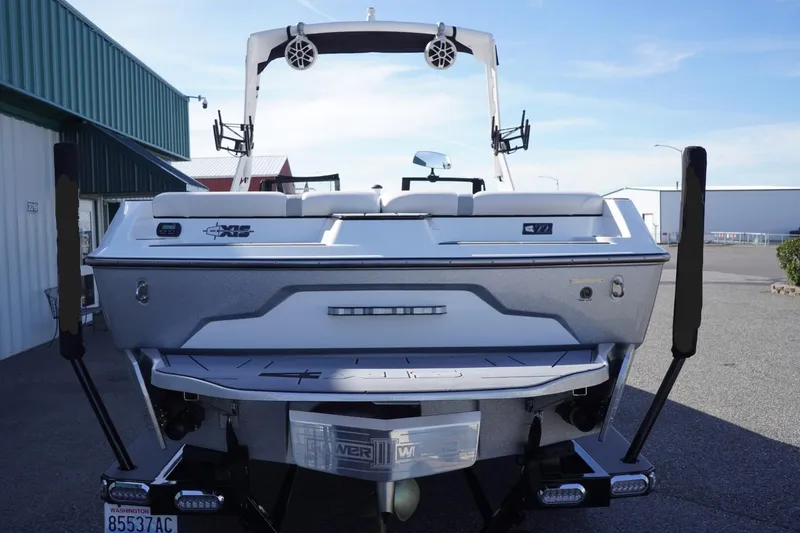 Slide: The Image of 2019 Axis A22 boat rear view with speakers and swim platform. - 8