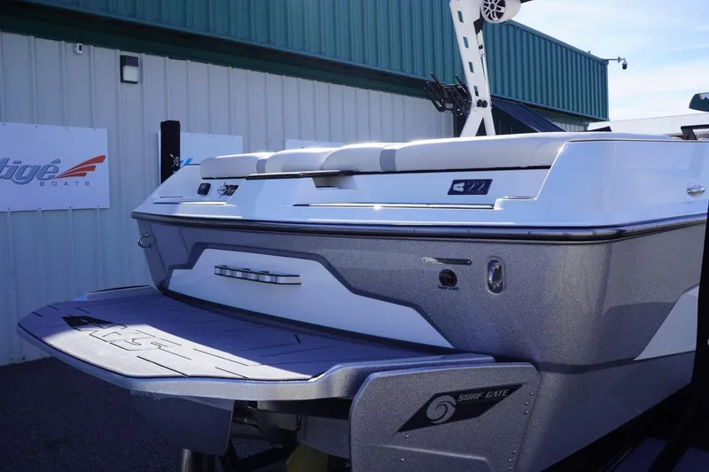 Slide: The Image of 2019 Axis A22 boat rear view with swim platform and wakeboard tower. - 9