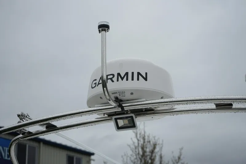 Slide: The Image of Garmin radar on 2025 Sea Sport 26' Aleutian boat, overcast sky background. - 18