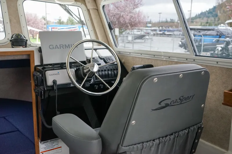 Slide: The Image of 2025 Sea Sport 26' Aleutian boat interior with Garmin navigation system. - 7