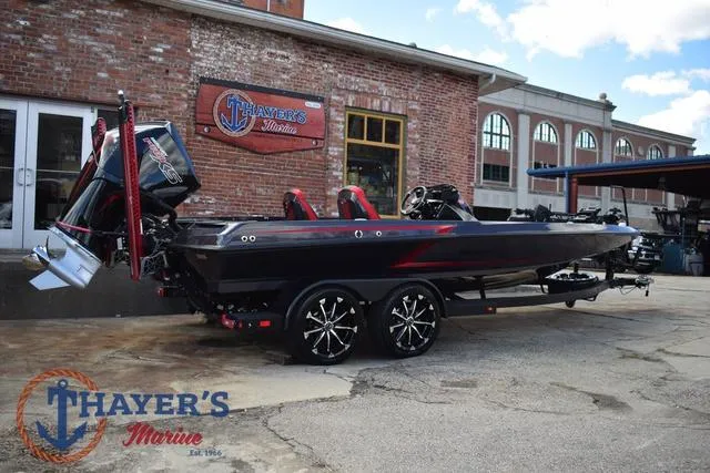 Slide: The Image of 2024 Ikon Boats LX21 on trailer at Thayer's Marine dealership. - 3