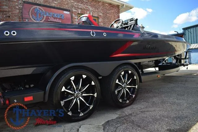 Slide: The Image of 2024 Ikon Boats LX21 on trailer with stylish wheels at Thayer's Marine. - 37