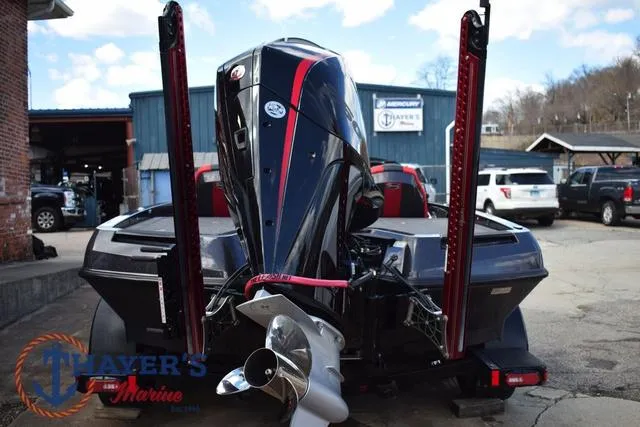 Slide: The Image of 2024 Ikon Boats LX21 with powerful outboard motor at Thayer's Marine. - 4