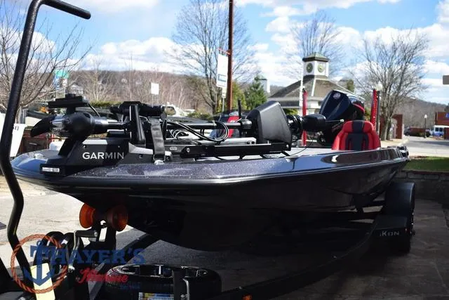 Slide: The Image of 2024 Ikon Boats LX21 with Garmin equipment, parked outdoors on a sunny day. - 41