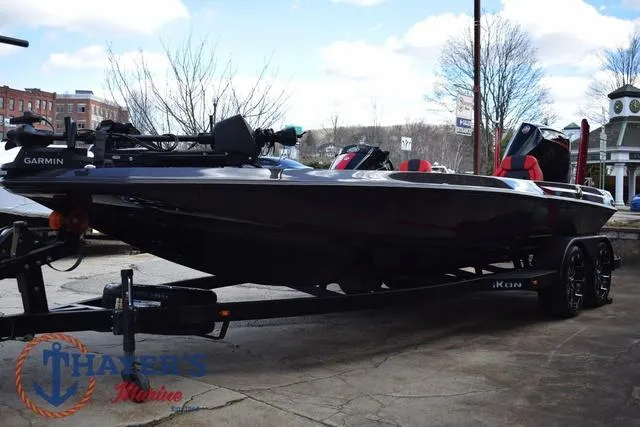 Slide: The Image of 2024 Ikon Boats LX21 on trailer, featuring sleek design and Garmin equipment. - 6