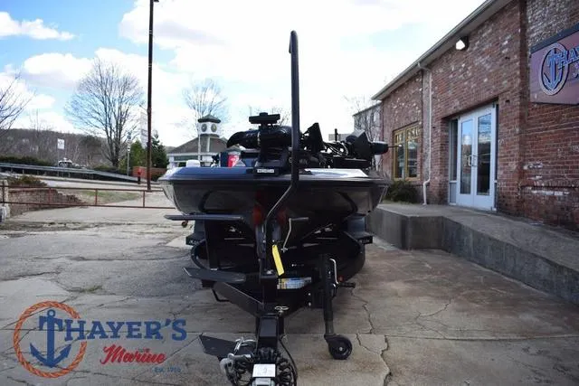 Slide: The Image of 2024 Ikon Boats LX21 parked outside Thayer's Marine building. - 7