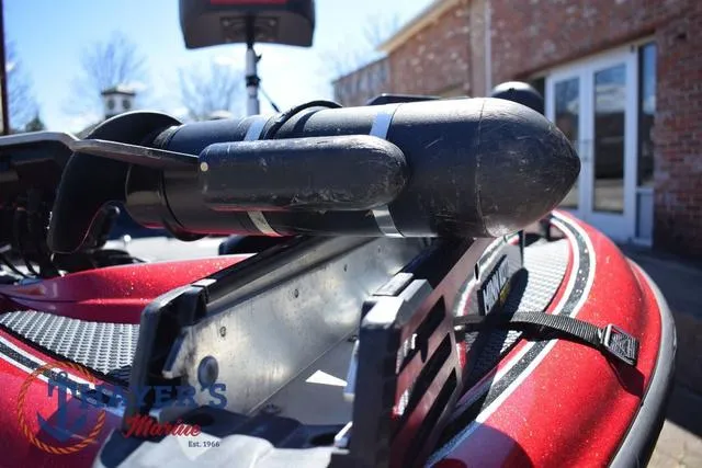 Slide: The Image of 2021 Triton 18 TrX boat with mounted equipment, close-up view. - 31