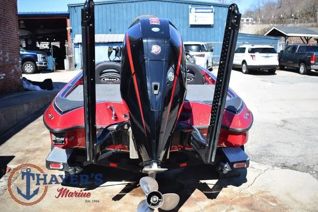 Slide: The Image of 2021 Triton 18 TrX boat, rear view, at Thayer's Marine dealership. - 4