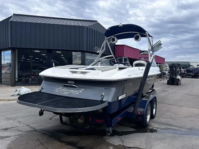 Slide: The Image of Engine compartment of a 2008 Tigé 24 VE boat, featuring a 340 HP engine. - 2