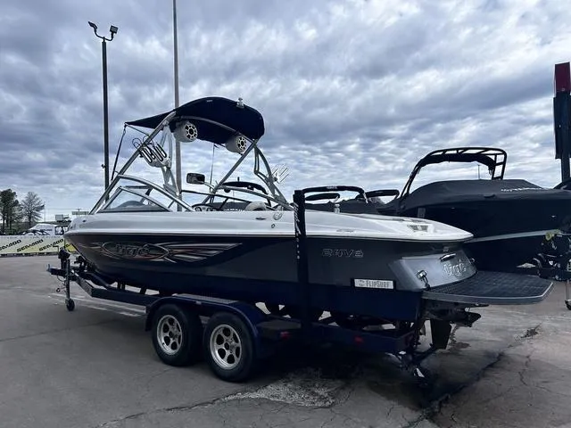 Slide: The Image of 2008 Tigé 24 VE boat interior with spacious seating and modern design. - 4