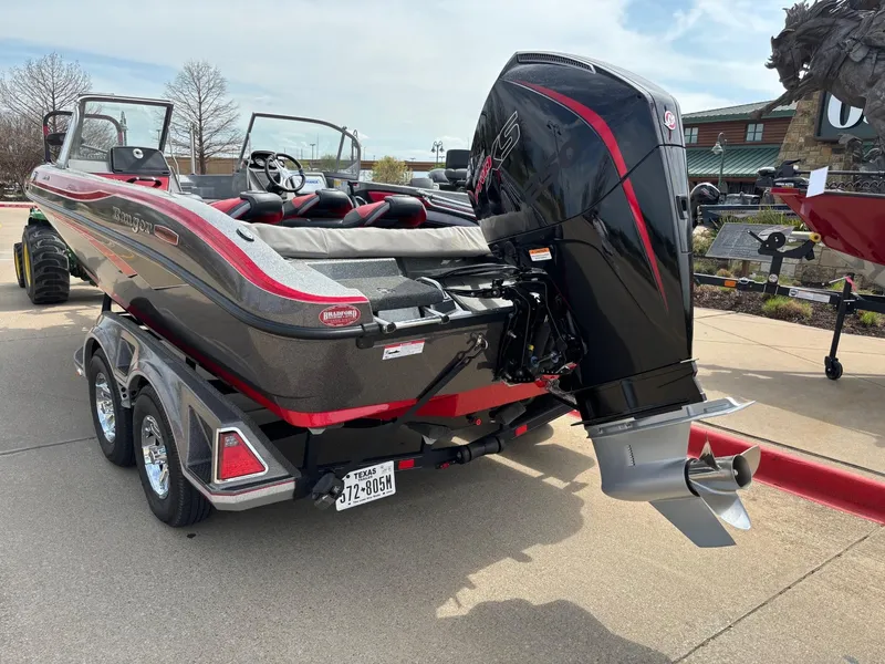 Slide: The Image of 2022 Ranger 2050MS boat with powerful outboard motor on a trailer. - 3