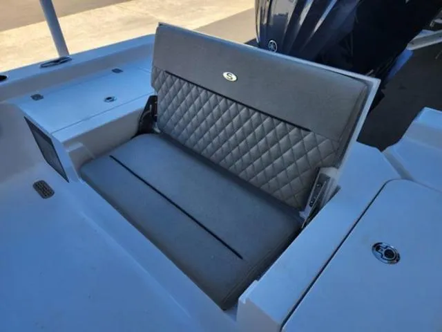 Slide: The Image of 2025 Sportsman MASTERS 247OE boat seat with quilted gray upholstery. - 14