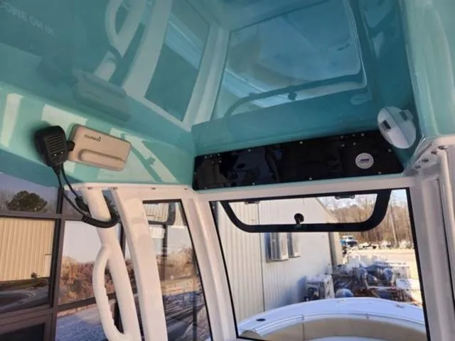 Slide: The Image of Interior view of a 2025 Sportsman Heritage 231 boat, showcasing modern design features. - 4