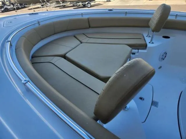 Slide: The Image of 2025 Sportsman Heritage 231 boat interior with cushioned seating and modern design. - 7