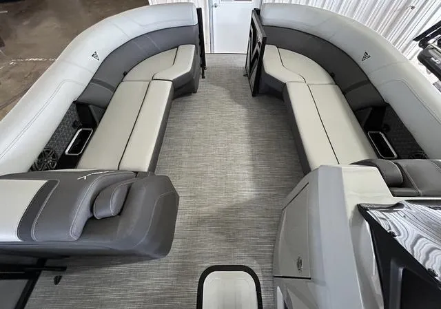Slide: The Image of 2025 VIAGGIO by Misty Harbor Z22Q pontoon boat interior with gray seating and carpet. - 3