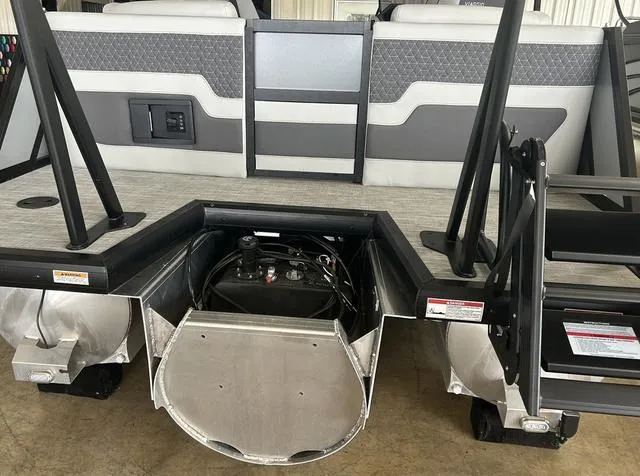Slide: The Image of 2025 VIAGGIO by Misty Harbor Z22Q pontoon boat, rear view showing engine compartment and seating. - 7