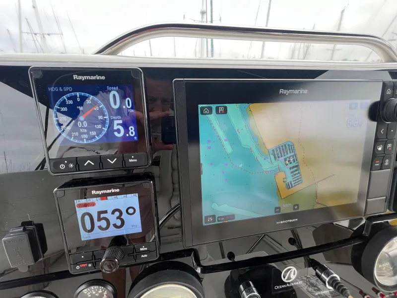 Slide: The Image of Helm of 1999 Ocean Alexander Sundeck 460 with Raymarine navigation displays. - 16