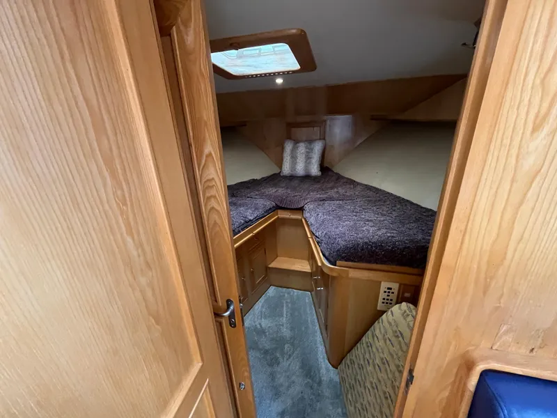 Slide: The Image of Cozy cabin interior of 1999 Ocean Alexander Sundeck 460 yacht with wooden finish. - 33