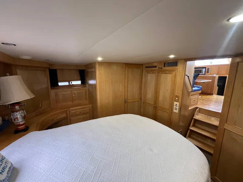 Slide: The Image of Luxurious cabin interior of 1999 Ocean Alexander Sundeck 460 yacht with wooden furnishings. - 38