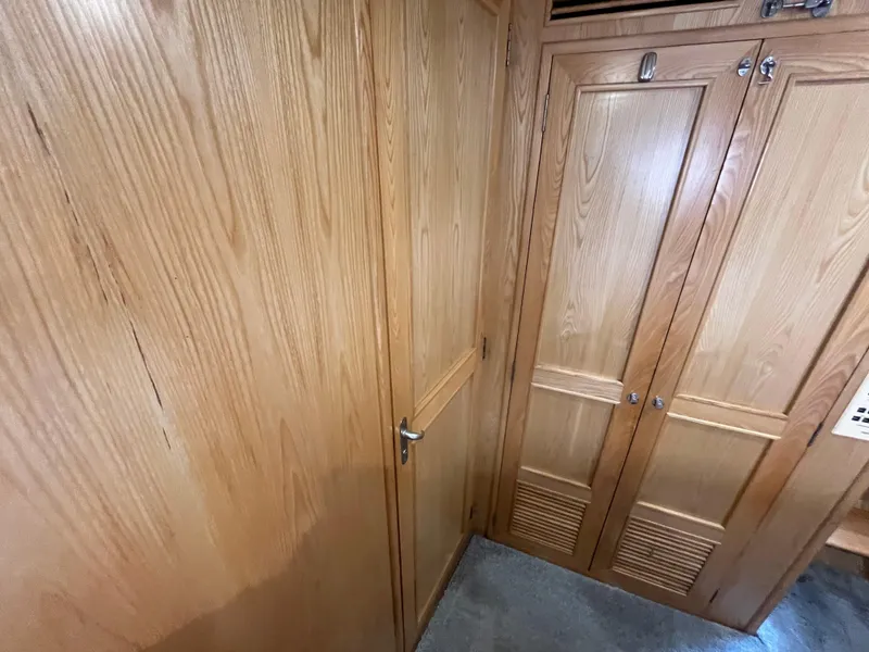 Slide: The Image of Interior wooden cabinetry on a 1999 Ocean Alexander Sundeck 460 yacht. - 41
