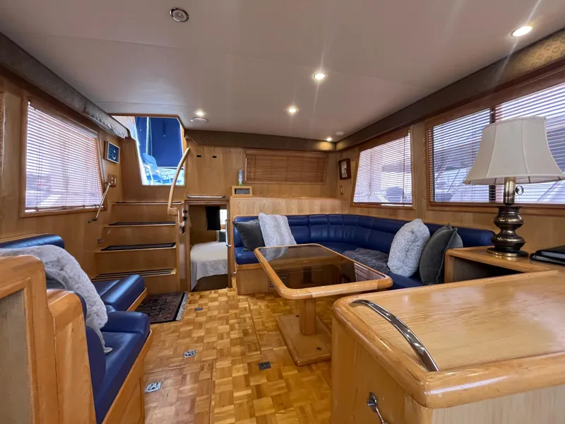 Slide: The Image of Luxurious interior of 1999 Ocean Alexander Sundeck 460 yacht with elegant wood finishes. - 21