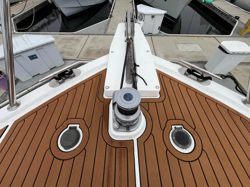 Slide: The Image of Bow of 1999 Ocean Alexander Sundeck 460 with teak decking and anchor winch. - 9