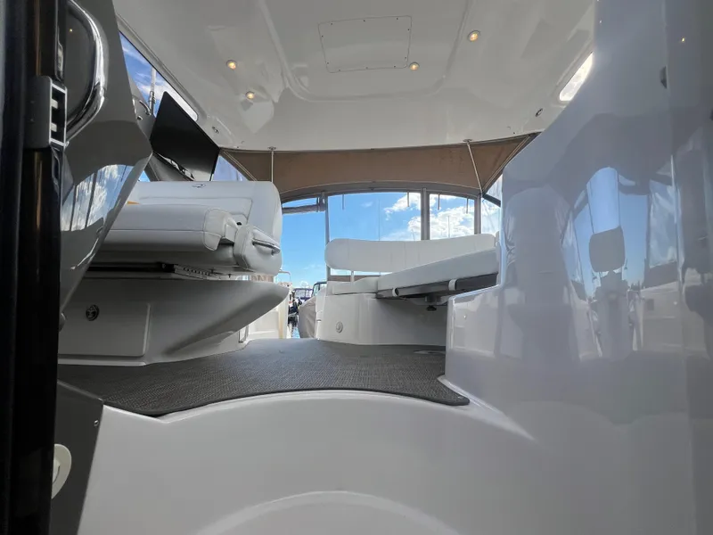Slide: The Image of Interior view of 2007 Regal Commodore 4060 yacht, featuring seating and modern design. - 23