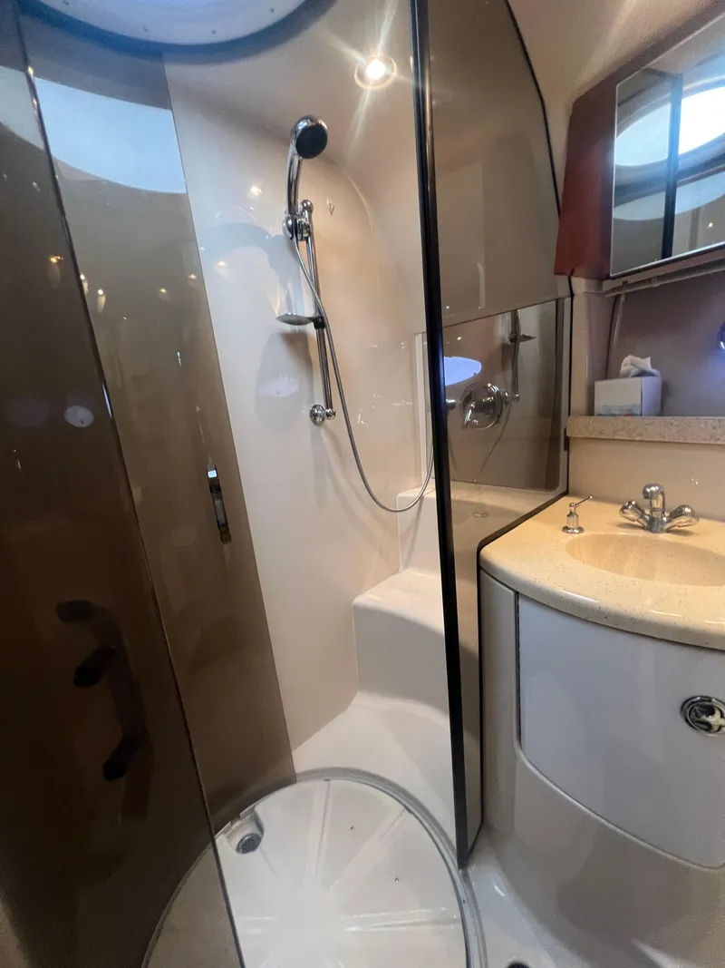 Slide: The Image of Bathroom interior of 2007 Regal Commodore 4060 yacht with shower and sink. - 27