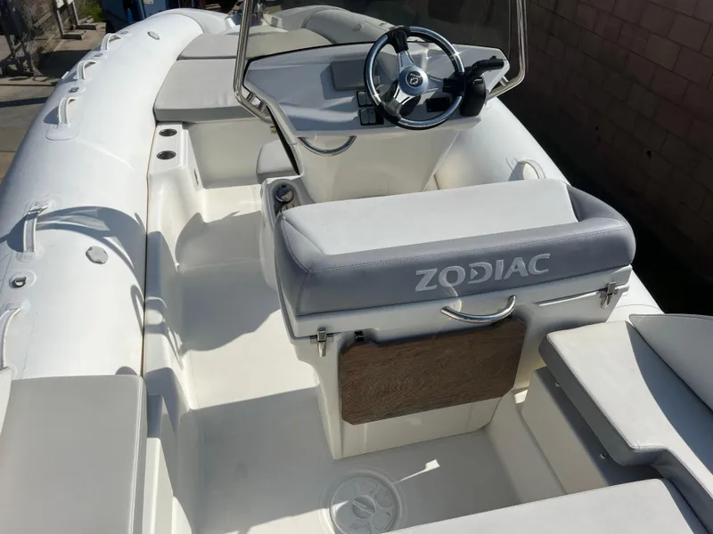 Slide: The Image of 2020 Zodiac N-ZO 600 boat interior with steering wheel and seating. - 10