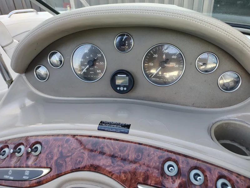 Slide: The Image of Dashboard of a 2000 Maxum 1900 SR boat with gauges and controls. - 6
